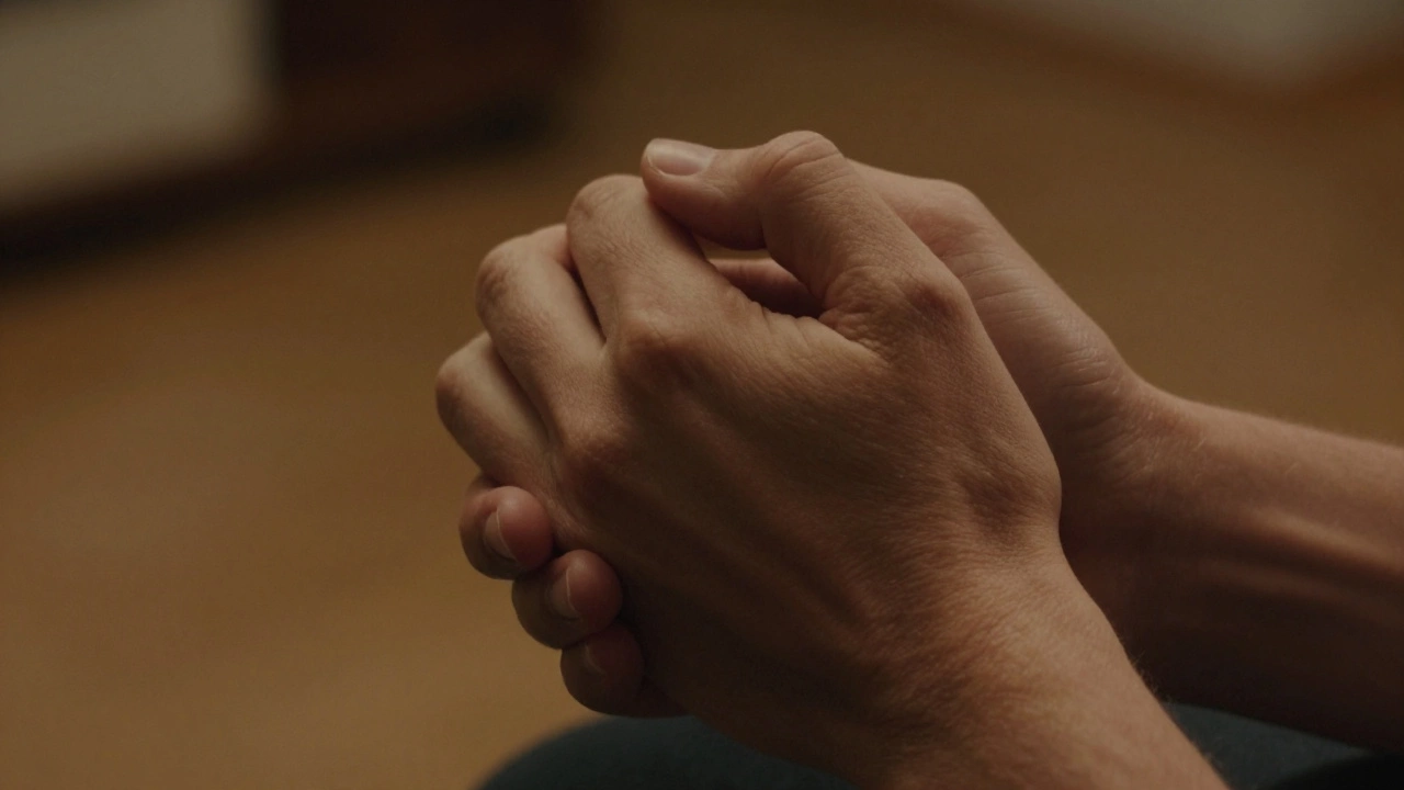 Couple holding hands gently, symbolizing vulnerability and emotional connection