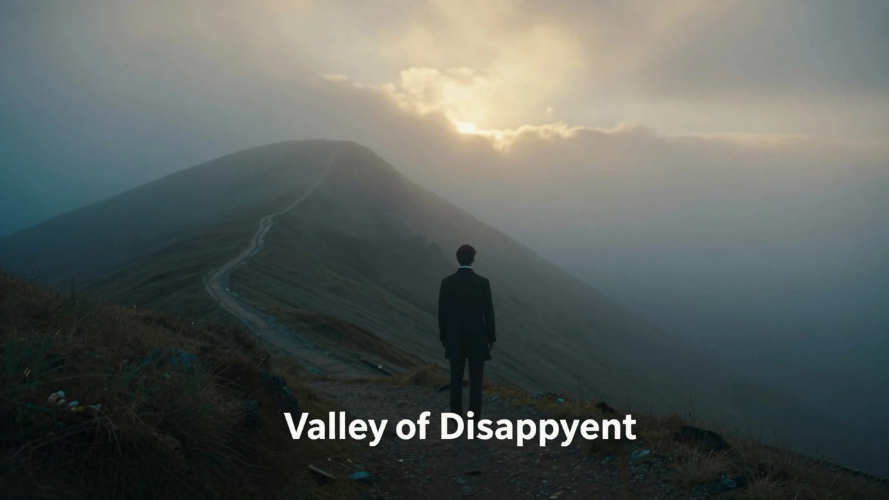 Gentleman standing at foot of foggy hill with sunrise ahead